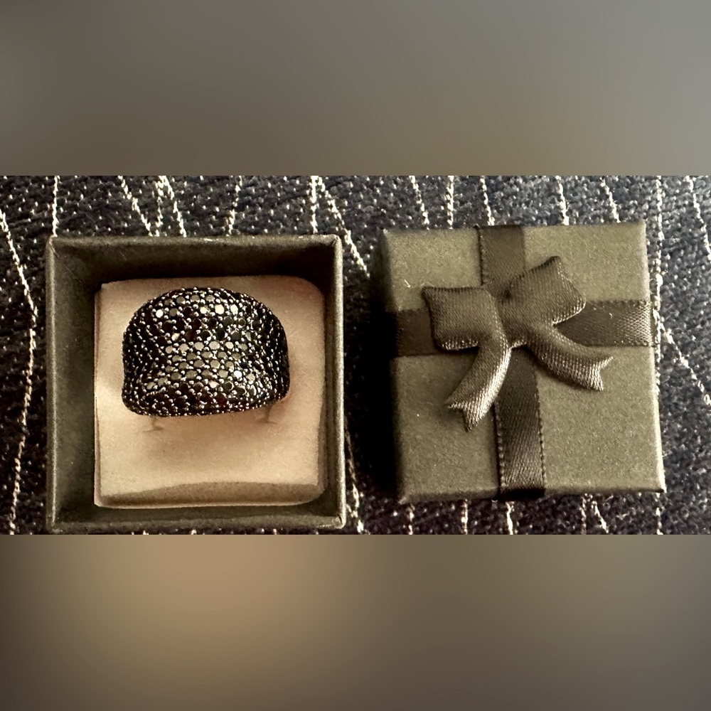 Crushed pave black spinel stones in plated rose gold. Size 10 ring.